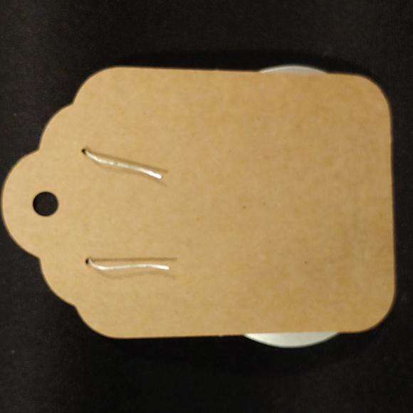 Silver Metal Earrings in a matte or brushed tone - Picture 2 of 2